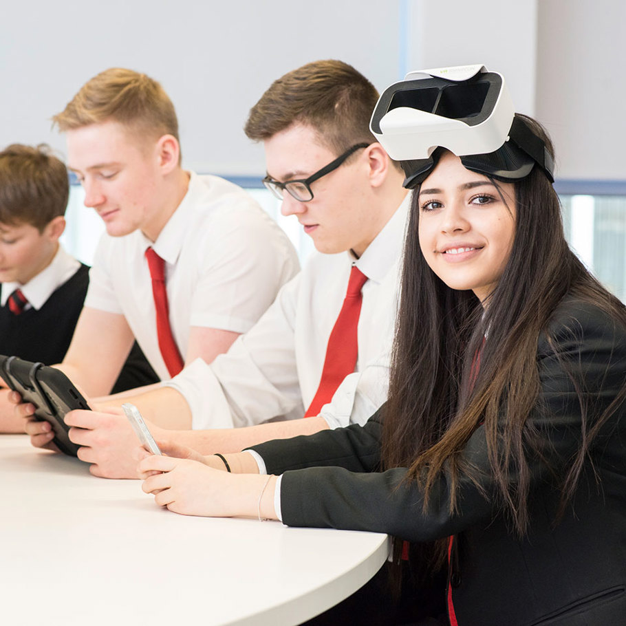 school students using technology 