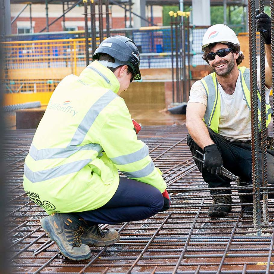 2 operatives building steel frame