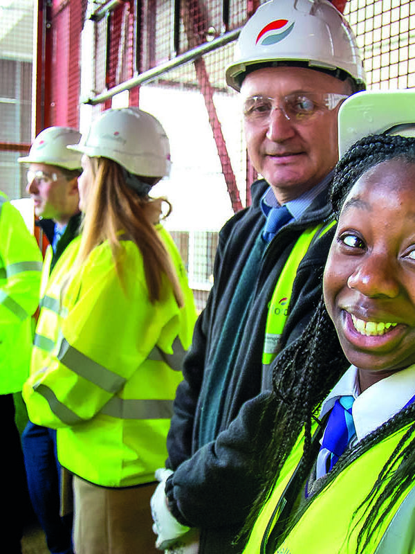people in PPE on site visit