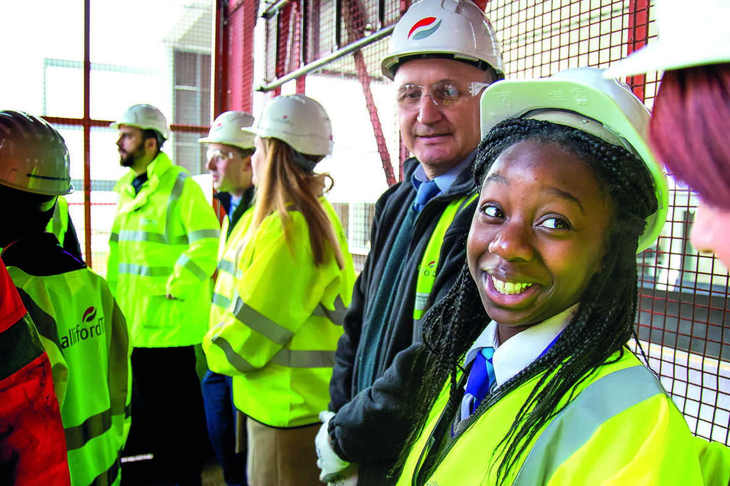 people in PPE on site visit