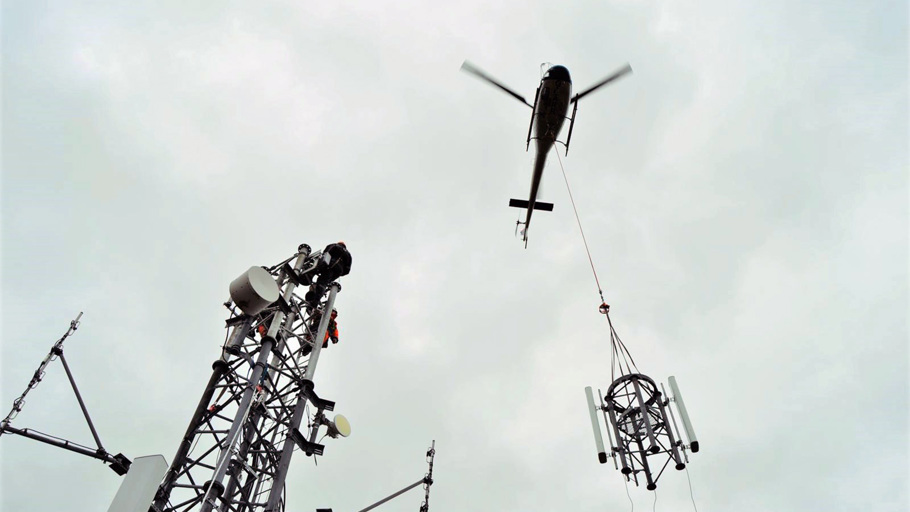 helicopter installing antenna 