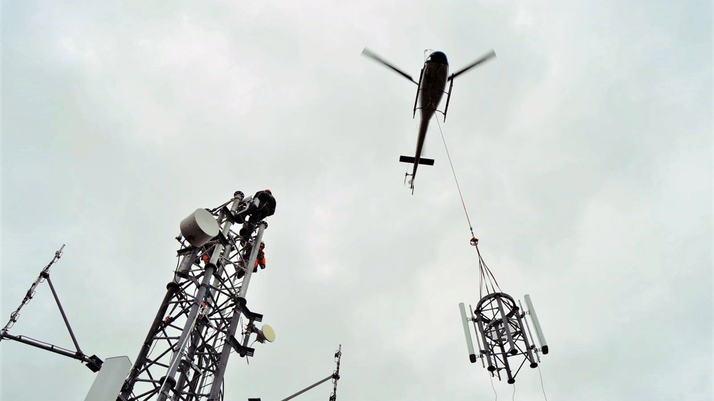 helicopter installing antenna Crop0